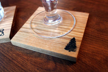 JTWoodworks wooden pine tree and moose coaster set will bring a touch of Maine into your home. Great barware for parties and entertaining at home.