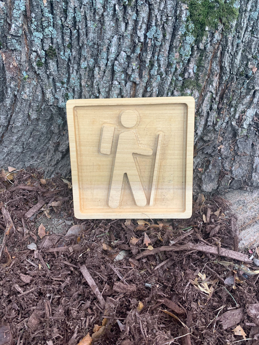 Handmade wood sign of National Parks Symbol for Hiking