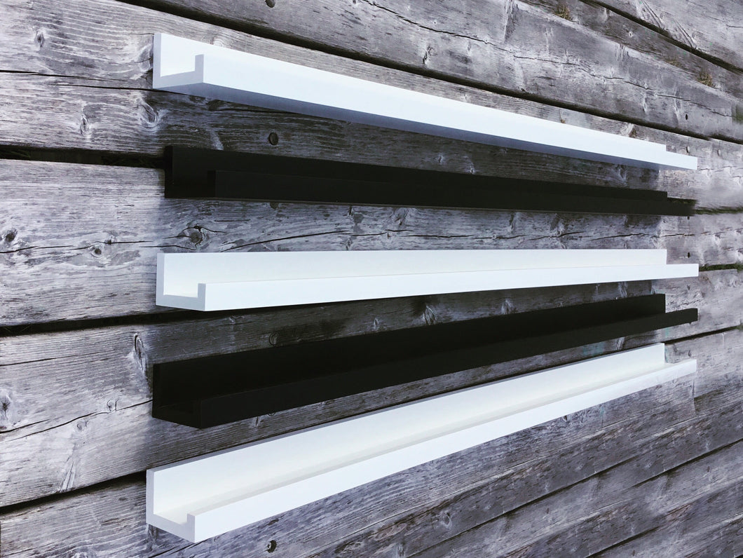 Black and white painted floating shelves