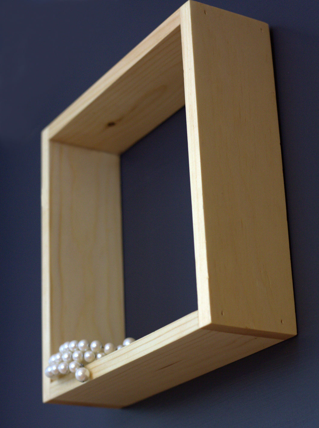 JTWoodworks cube shelf is a great way to get organized and display treasured items around your home or office. This functional wall cube shelf will help you stay organized in any space. 