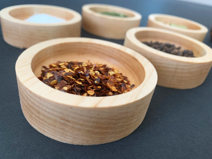 set of five small maple wood bowls to hold spices and condiments