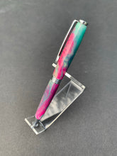 Handmade pink and turquoise marbled pen.